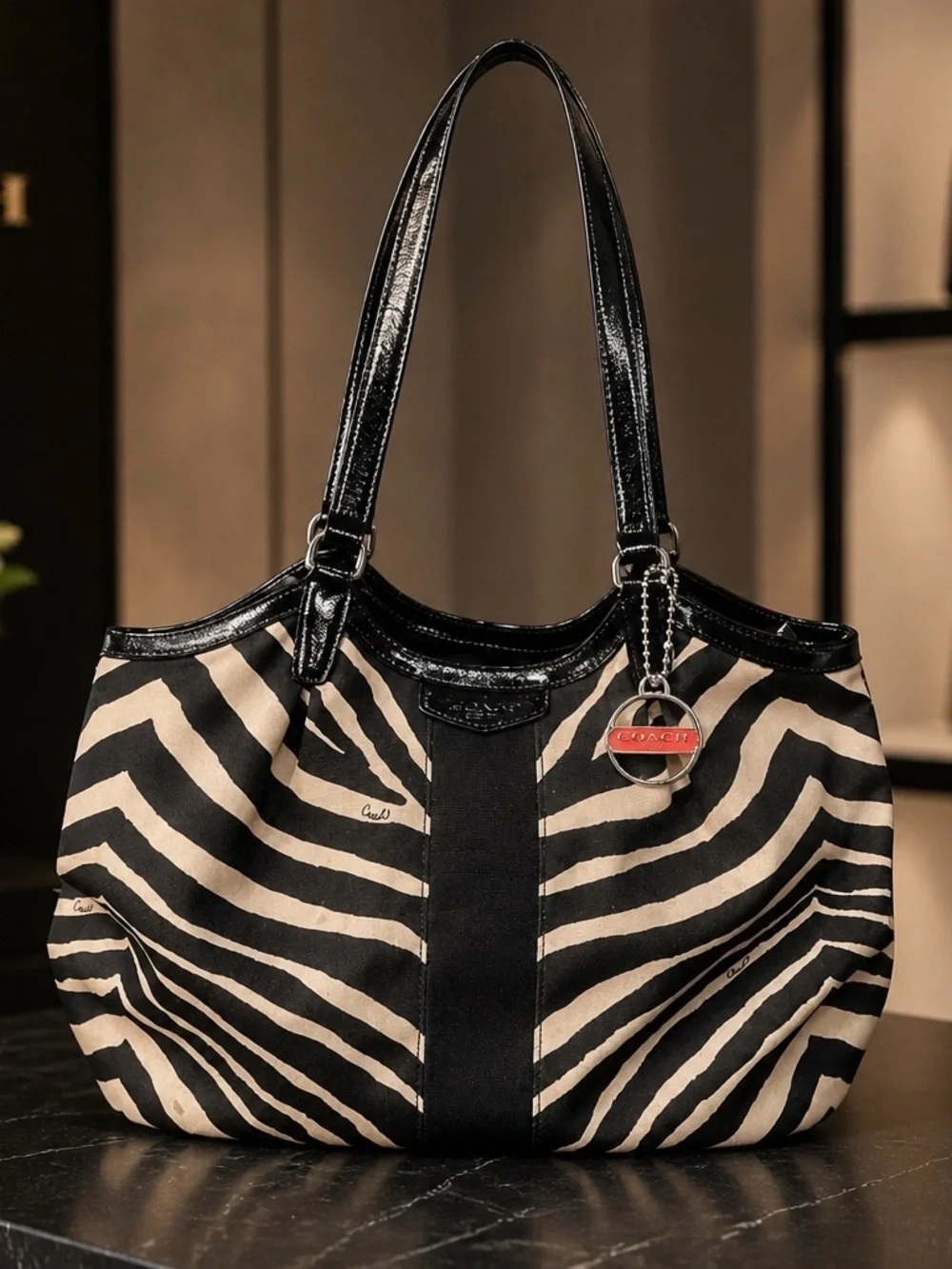 Coach Black and Cream Zebra-Print Devin Patent Leather Shoulder Tote